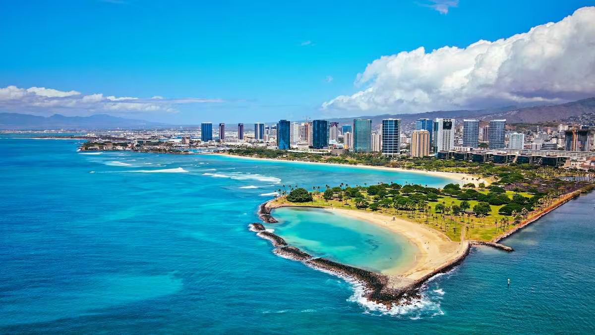 Ala Moana Beach Park with Honolulu condo towers behind it
