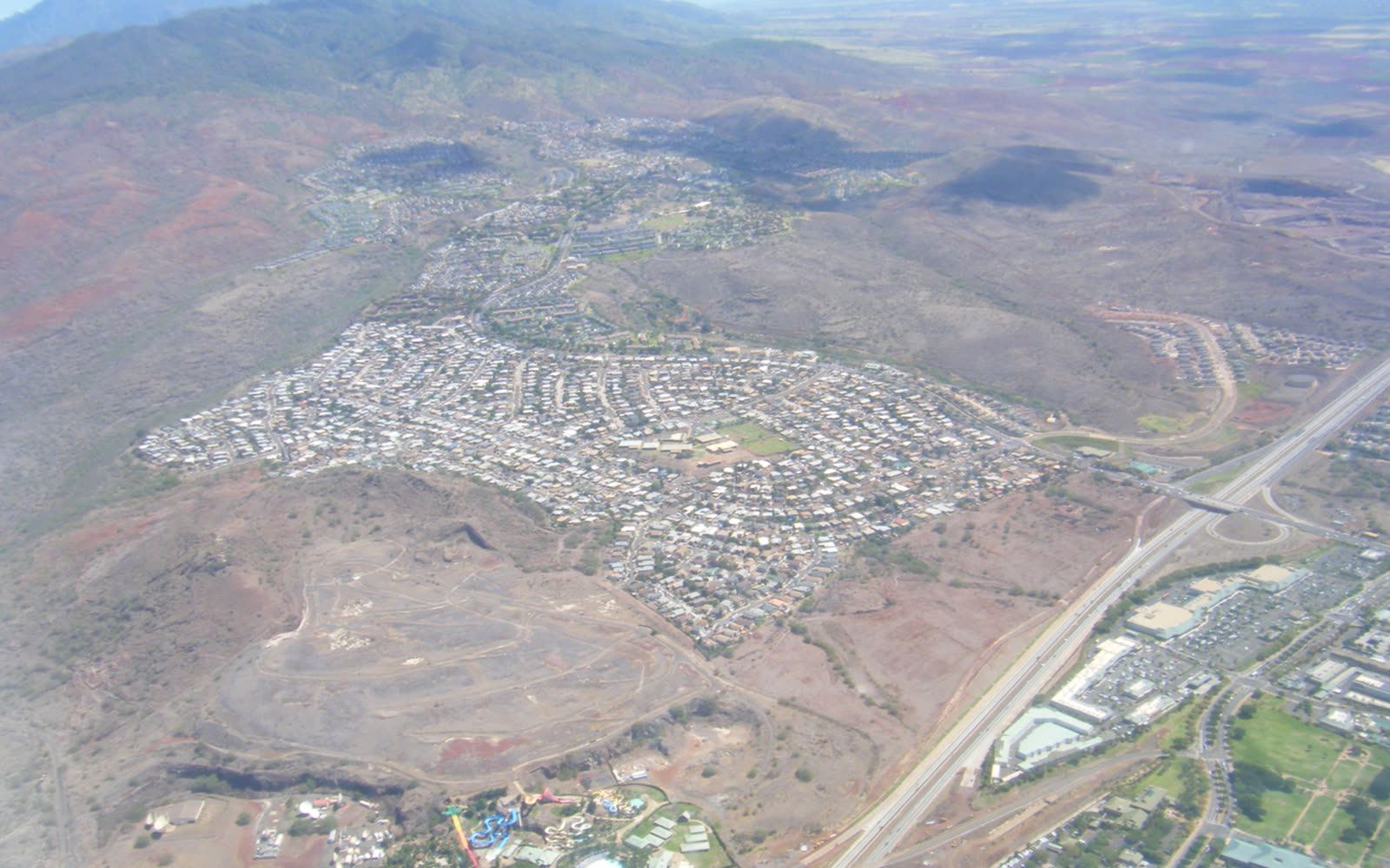 Aerial view of Makakilo homes climbing the ridge above Kapolei