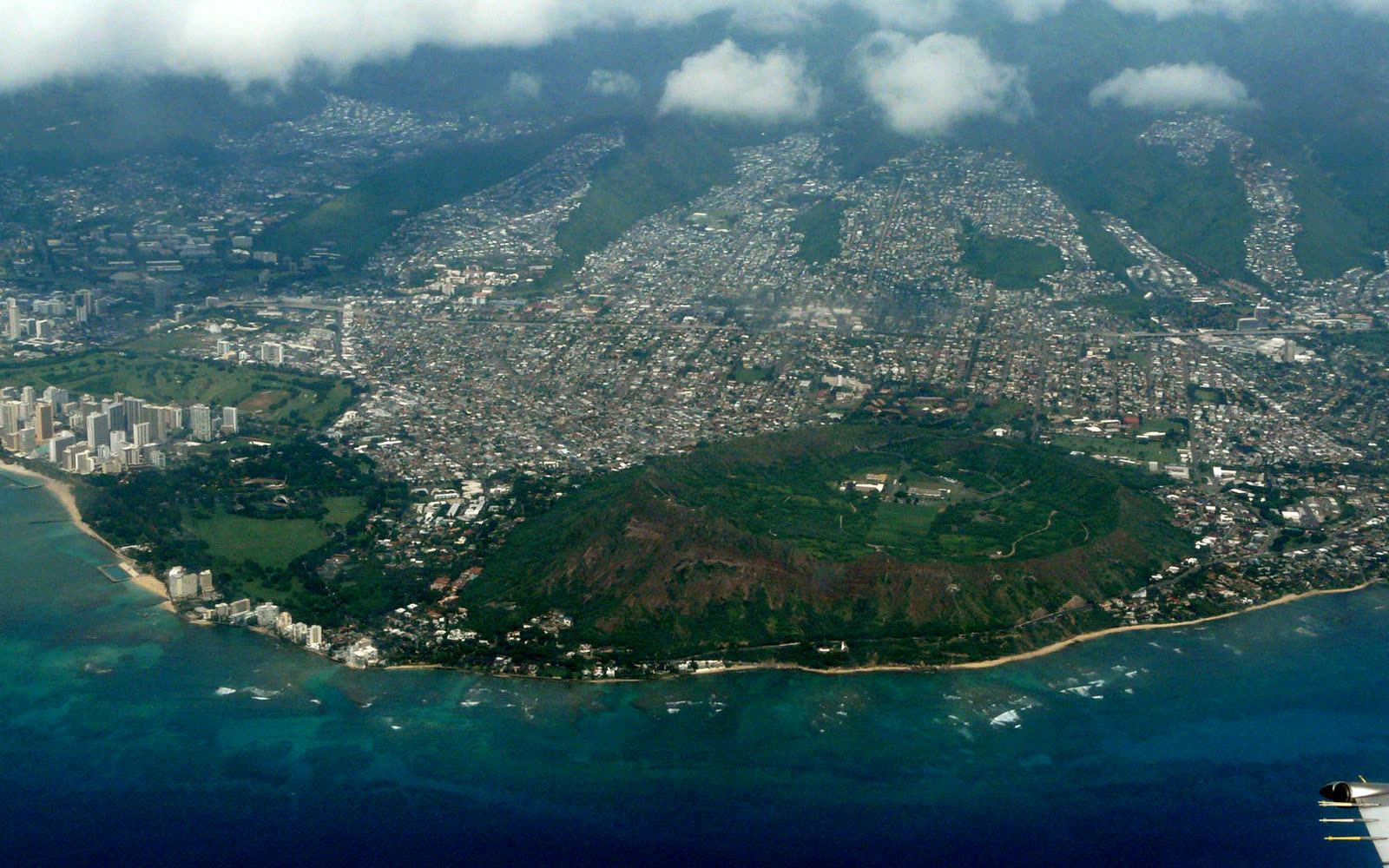 Aerial view of Diamond Head and east Honolulu with the Kāhala coast in front