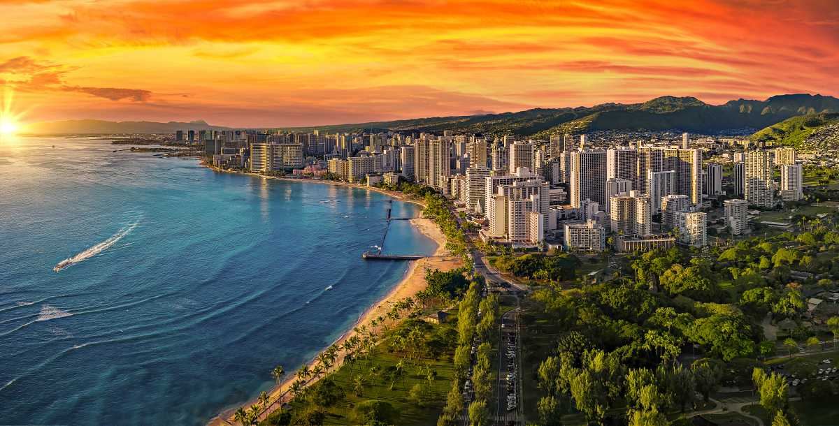 Waikīkī shoreline and towers seen from above the water